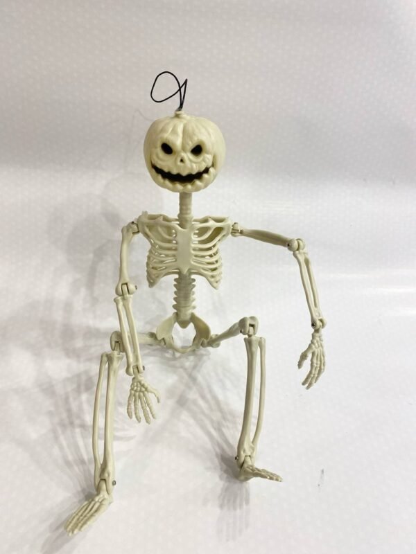 skeleton pumpkin figure